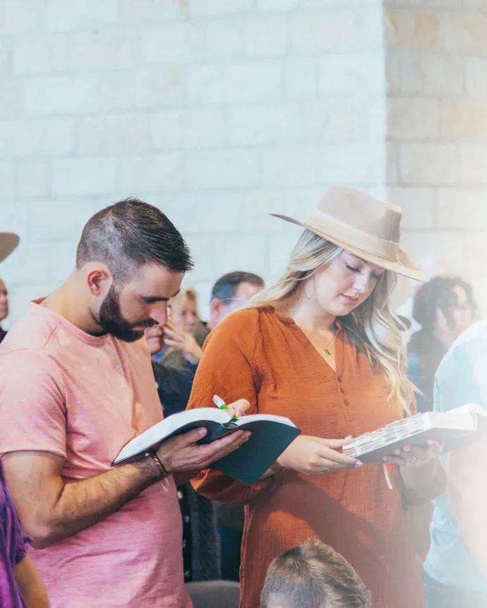 People reading their Bibles together