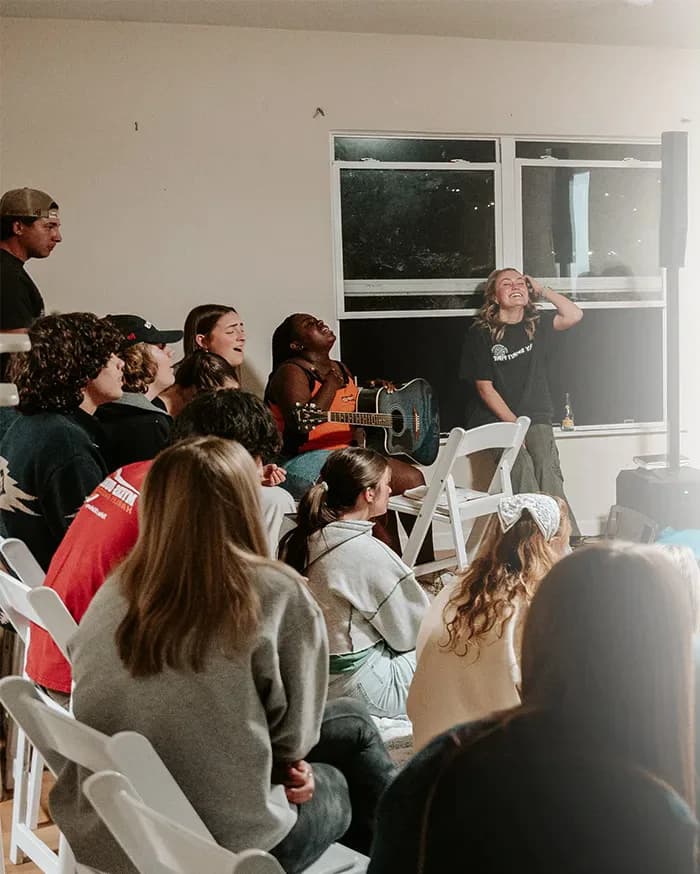 A gathering listening to the message