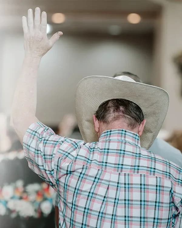 A hand raised in worship